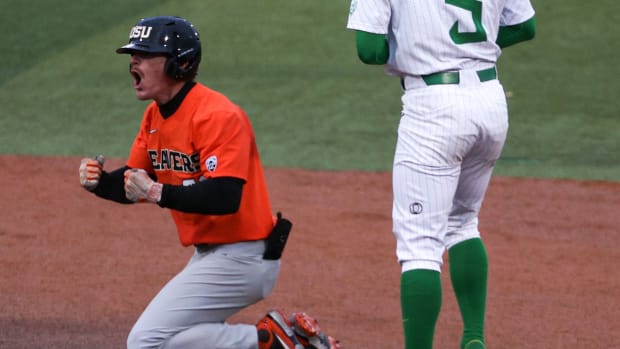 SF Giants prospect Wade Meckler celebrates after sliding into second base with Oregon State. (2022)
